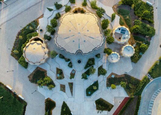 The mosque features innovative passive design elements, including strategically positioned skylights and traditional Arabic screens